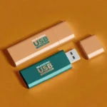 Two USB sticks with printed logos showing colour printing and finishing options for branded flash drives