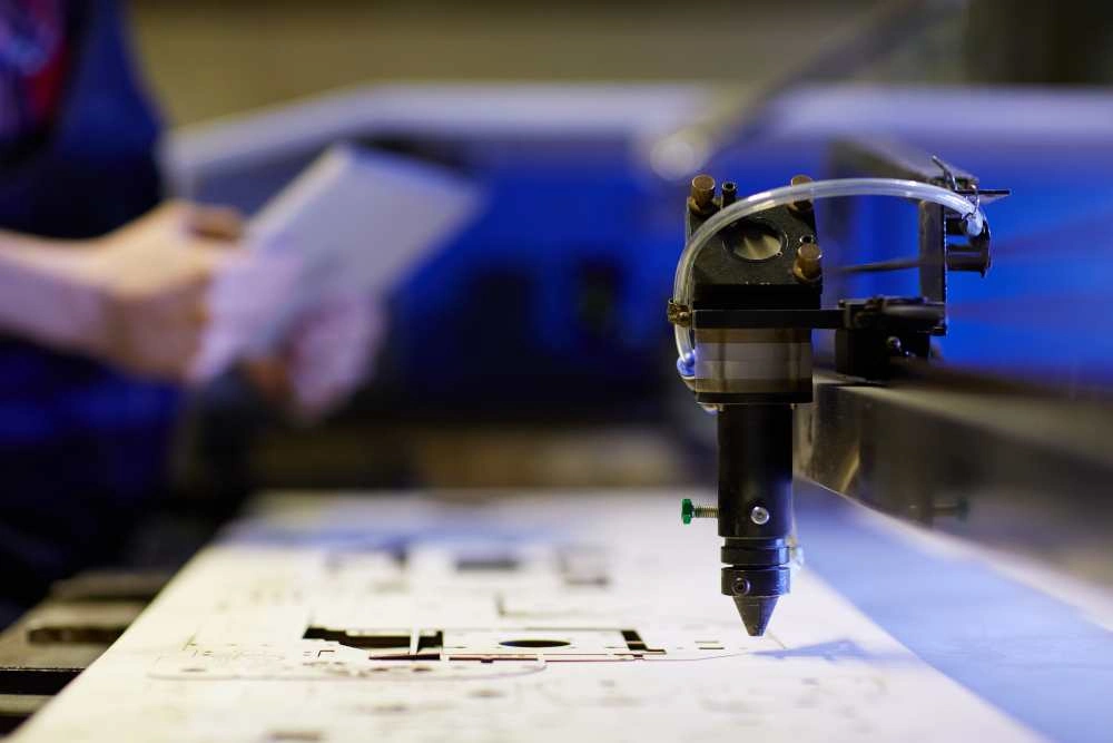 Laser cutting machine shaping a signage panel during metal laser cutting in Dubai